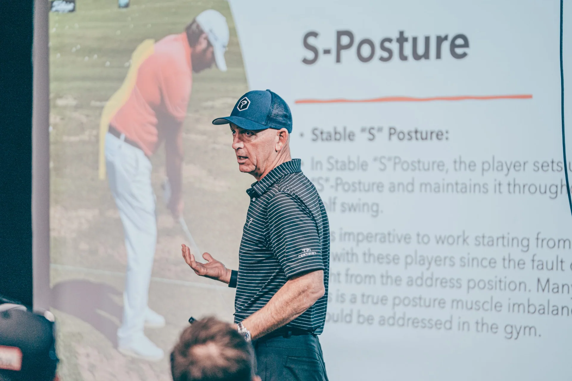 Coaching a golfer on posture and swing mechanics